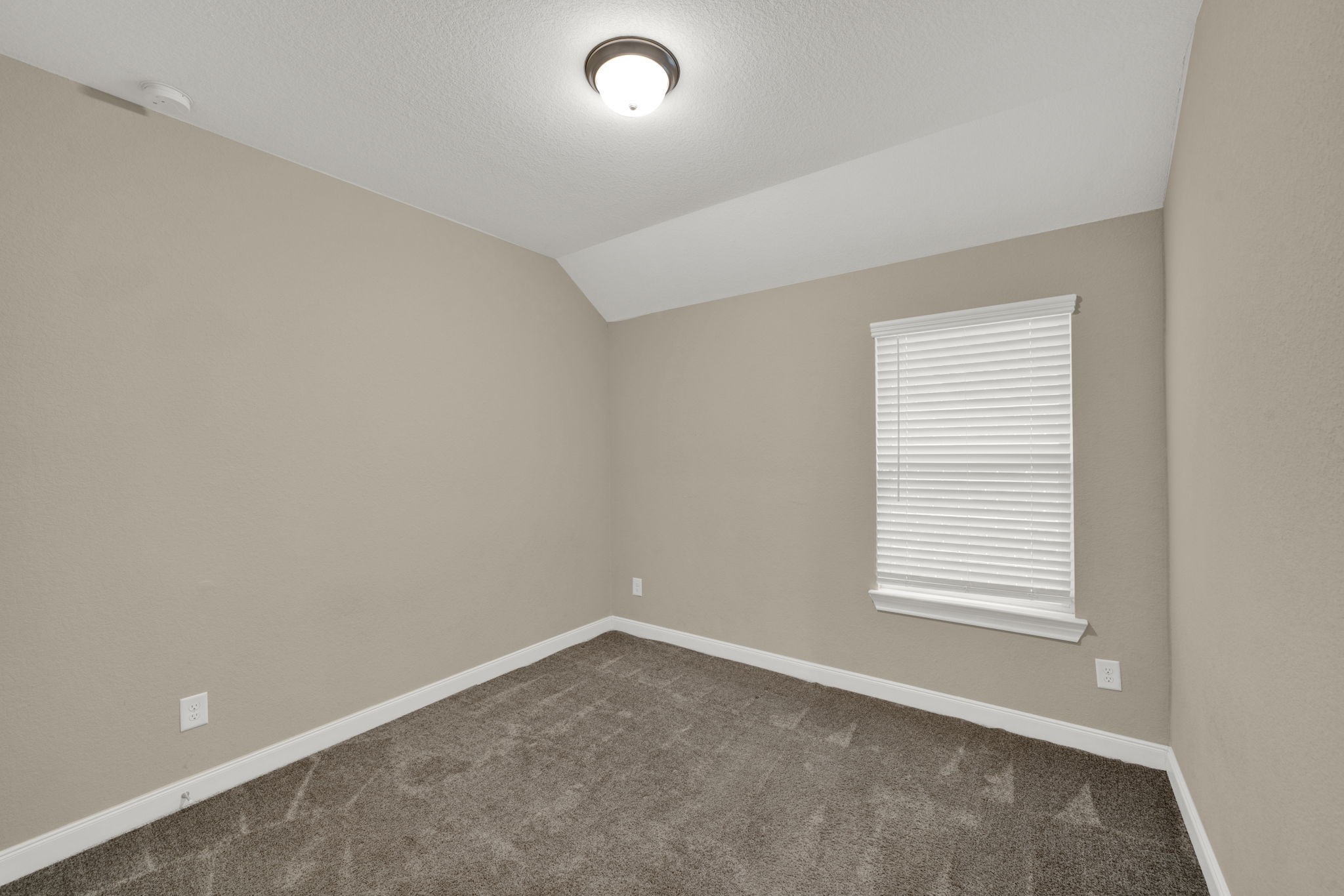 2217 Gadwall Court Conroe, TX 77384 - Photo 20 of 35 an empty room with a window