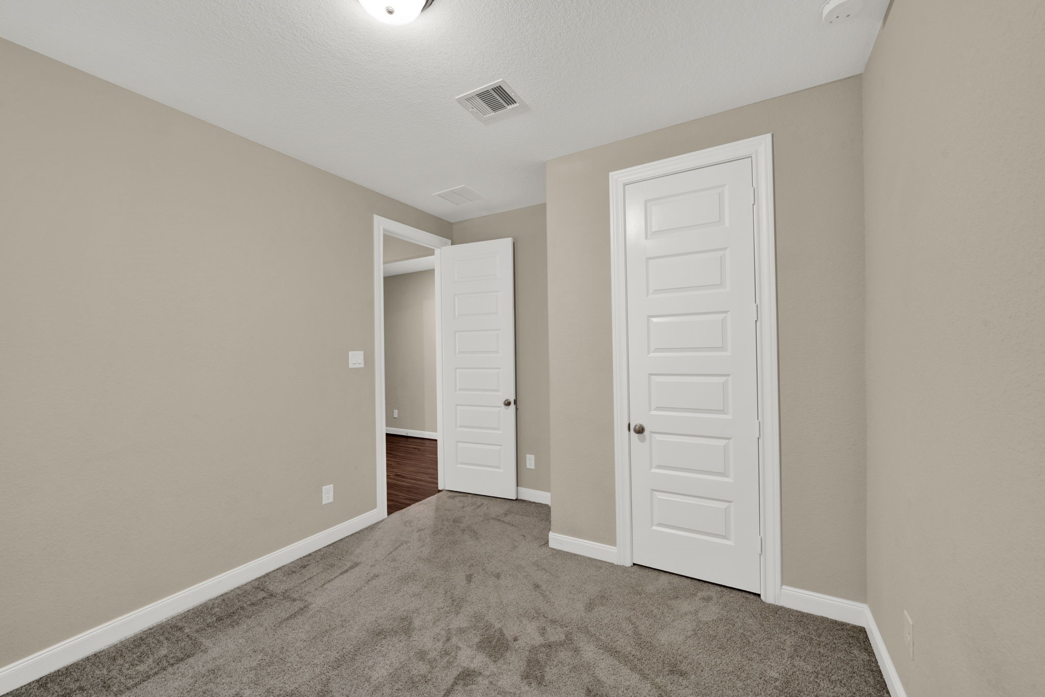 2217 Gadwall Court Conroe, TX 77384 - Photo 21 of 35 an empty room with closet area