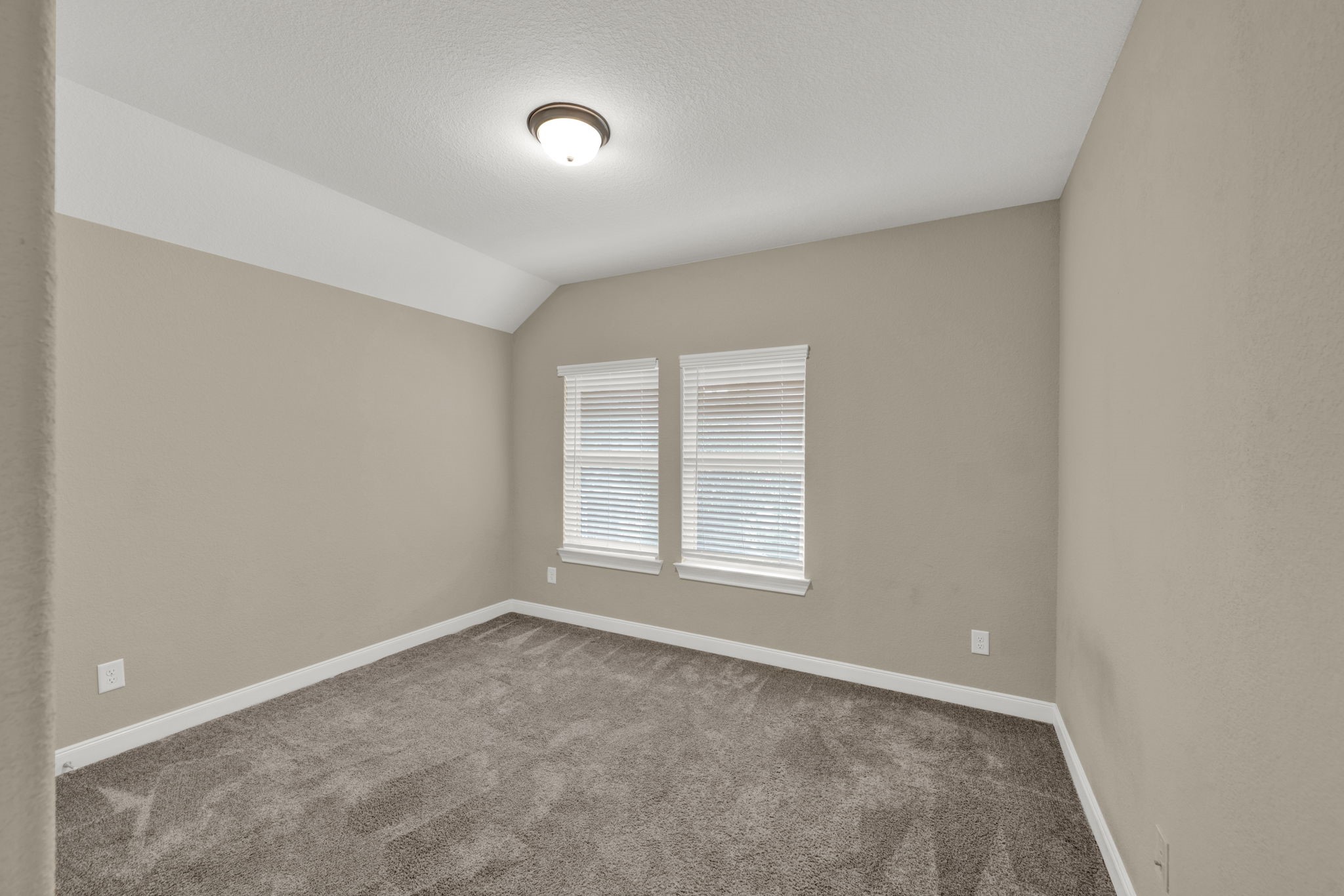 2217 Gadwall Court Conroe, TX 77384 - Photo 22 of 35 an empty room with a window