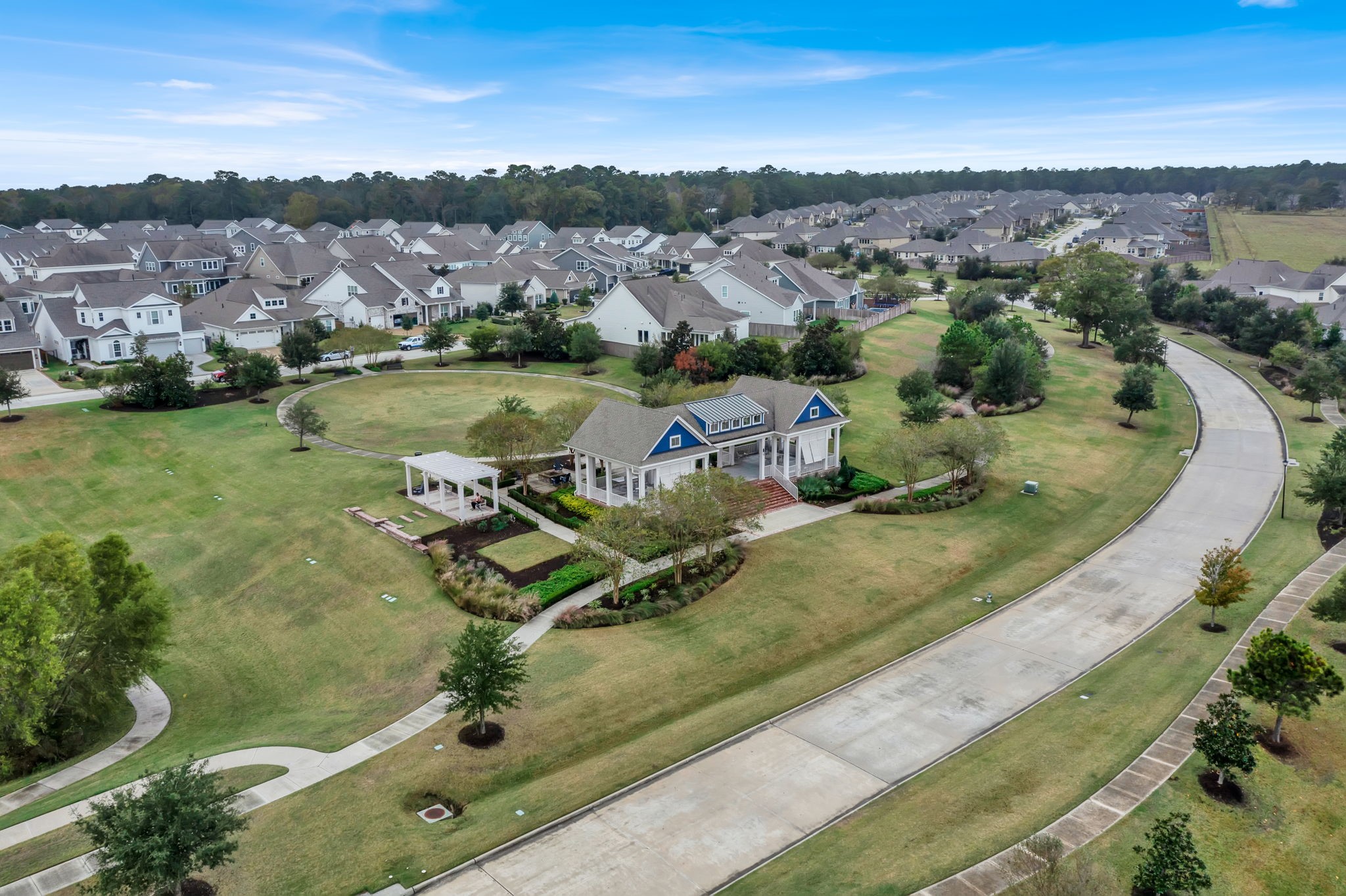 2217 Gadwall Court Conroe, TX 77384 - Photo 32 of 35 an aerial view of a house with a yard