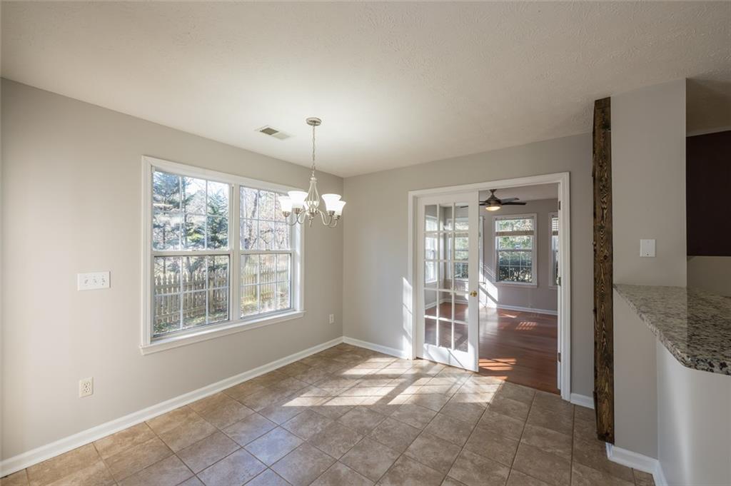 3789 Seattle Place Northwest Kennesaw, GA 30144 - Photo 18 of 40 a view of an empty room with a window