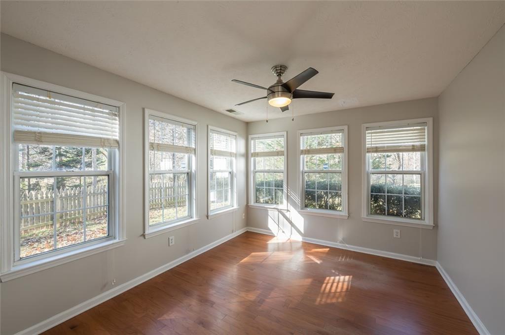 3789 Seattle Place Northwest Kennesaw, GA 30144 - Photo 20 of 40 a view of an empty room with a window and a kitchen