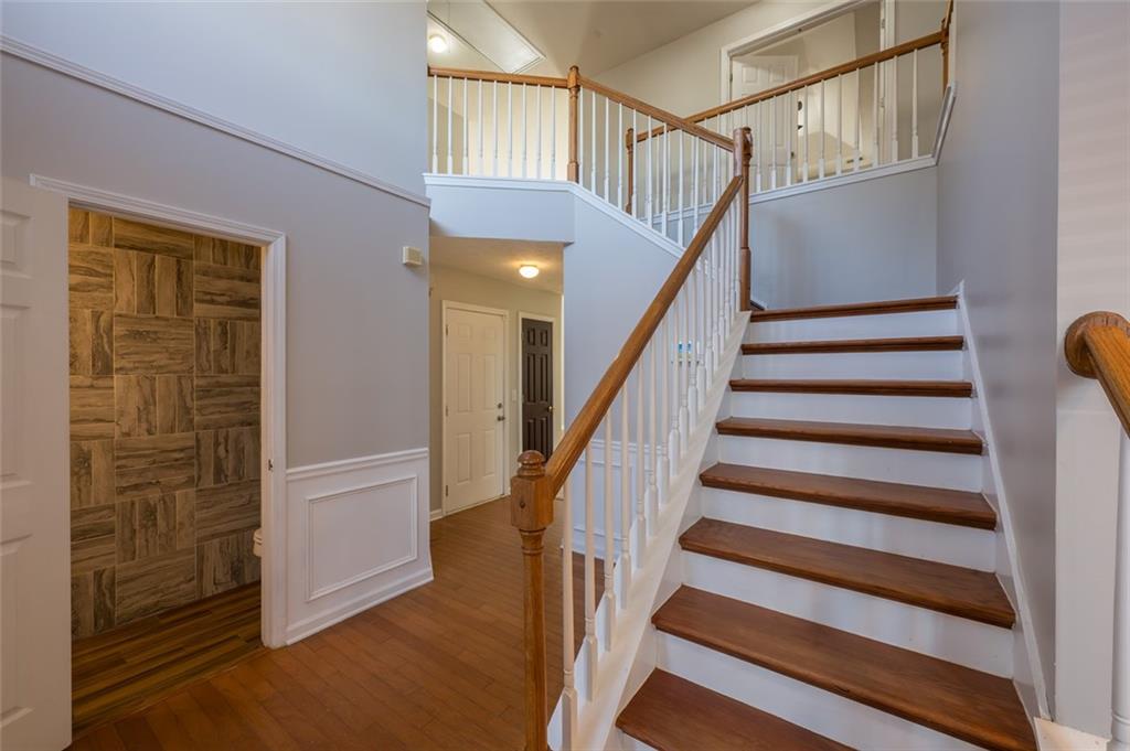 3789 Seattle Place Northwest Kennesaw, GA 30144 - Photo 23 of 40 a view of staircase with white walls and a window