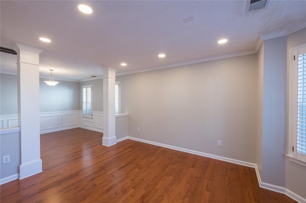 3789 Seattle Place Northwest Kennesaw, GA 30144 - Photo 5 of 40 a view of empty room with wooden floor