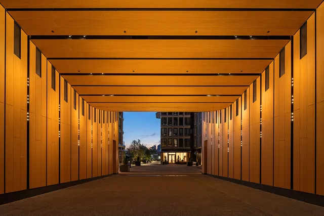 a view of a room with wooden walls