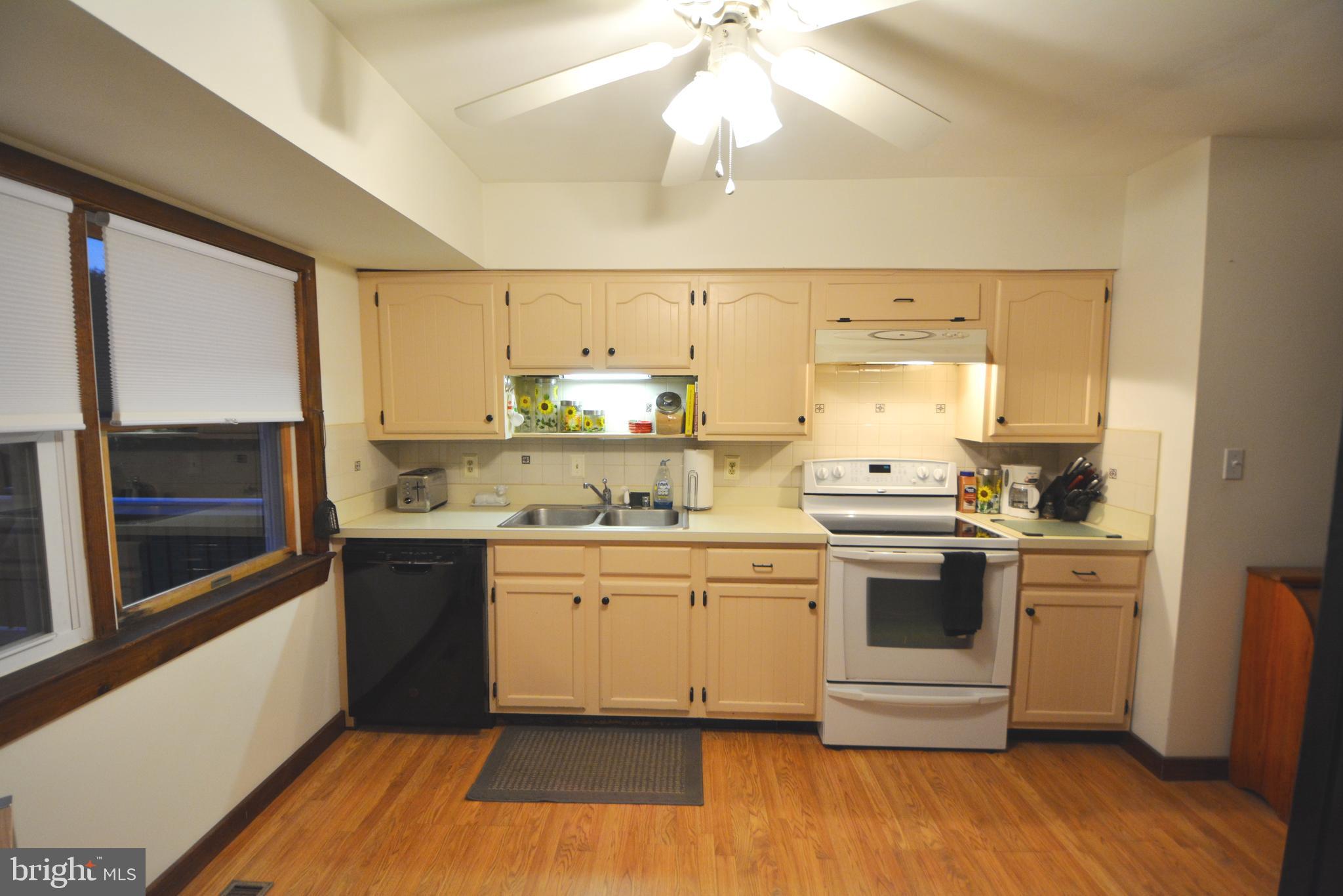 2523 Uniontown Road Westminster, MD 21158 - Photo 39 of 59 Kitchen stove, rangehood & dishwasher