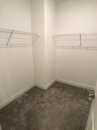 a view of a room with racks on the wall