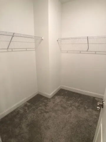 a view of a room with racks on the wall