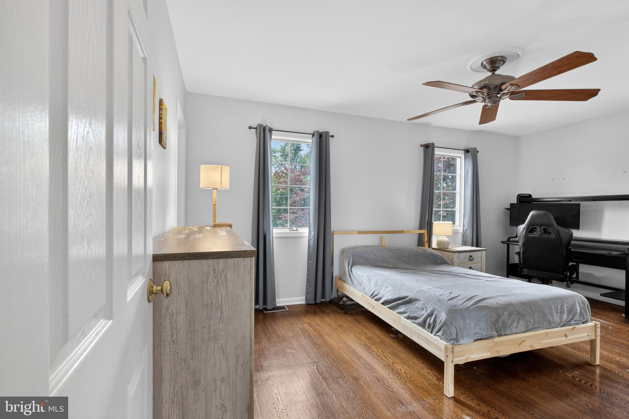 216 Revere Road Marlton, NJ 08053 - Photo 22 of 47 a bedroom with a bed and wooden floor