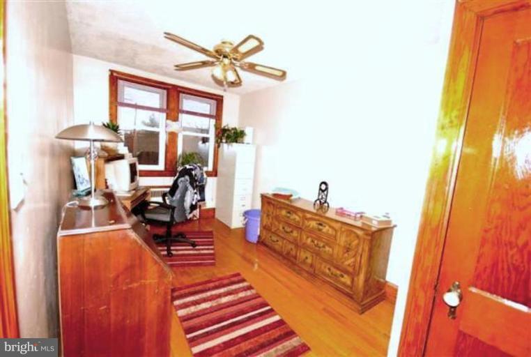 903 Calwell Road Baltimore, MD 21229 - Photo 3 of 19 a living room with furniture and a large window