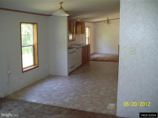 30 Hemlock Road Manchester, PA 17345 - Photo 11 of 25 an empty room with windows and cabinet