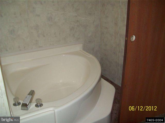 30 Hemlock Road Manchester, PA 17345 - Photo 18 of 25 a close up of a bathtub