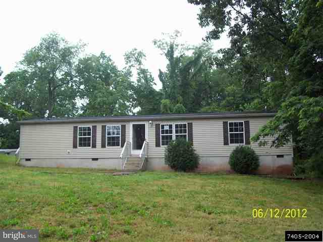 30 Hemlock Road Manchester, PA 17345 - Photo 20 of 25 a view of a house with a yard and potted plants