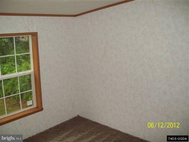 30 Hemlock Road Manchester, PA 17345 - Photo 22 of 25 a view of a small space with wooden floor and a window