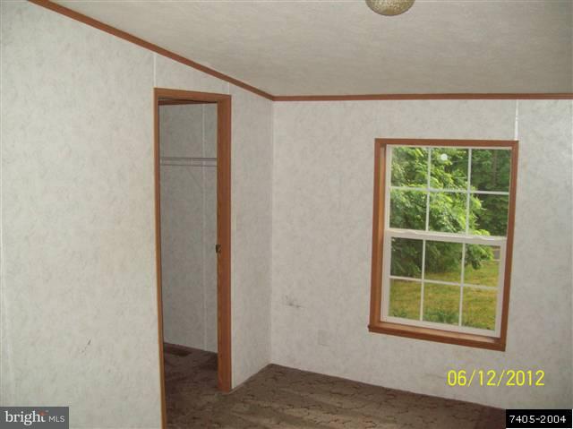 30 Hemlock Road Manchester, PA 17345 - Photo 23 of 25 a view of an empty room with a window