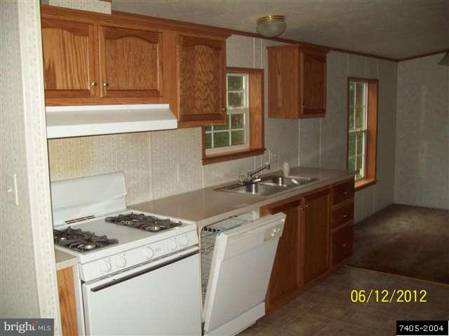 30 Hemlock Road Manchester, PA 17345 - Photo 24 of 25 a kitchen with a stove and a sink