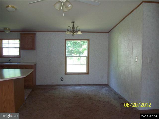 30 Hemlock Road Manchester, PA 17345 - Photo 8 of 25 a view of an empty room with a window