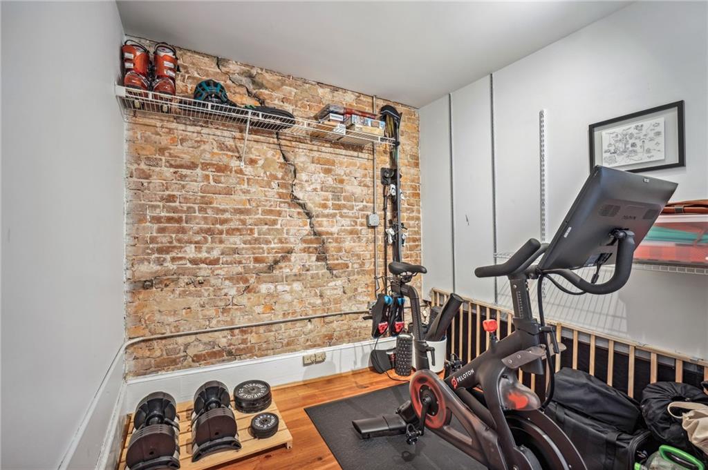 215 Mitchell Street Southwest, Unit 19 Atlanta, GA 30303 - Photo 24 of 29 a bathroom with a bathtub and a shower