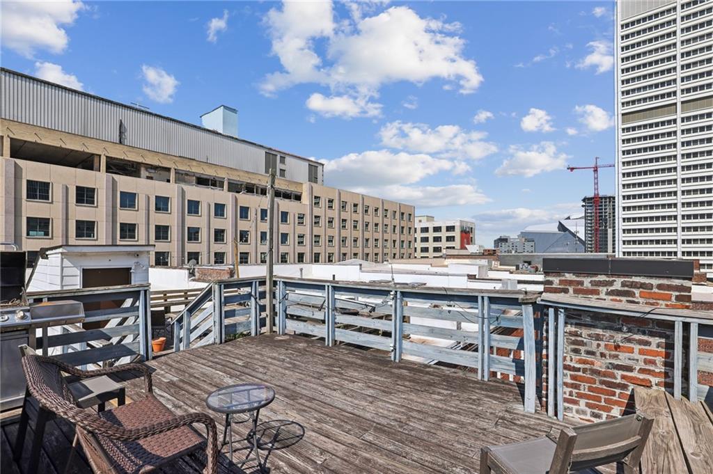 215 Mitchell Street Southwest, Unit 19 Atlanta, GA 30303 - Photo 26 of 29 a view of a chairs and table in the terrace