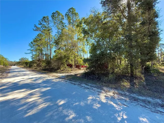 a view of house with outdoor space