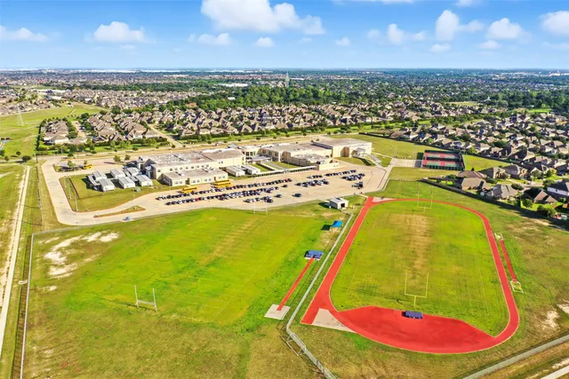 an aerial view of a swimming pool