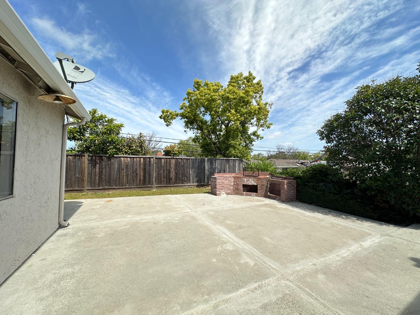 1710 Merrill Loop San Jose, CA 95124 - Photo 11 of 11 a view of backyard with small cabin and wooden fence