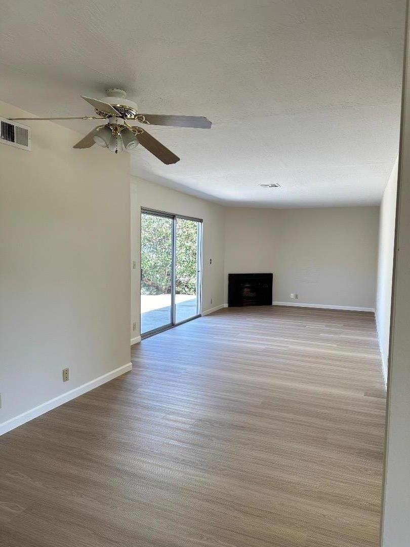 1710 Merrill Loop San Jose, CA 95124 - Photo 3 of 11 wooden floor in an empty room with a window