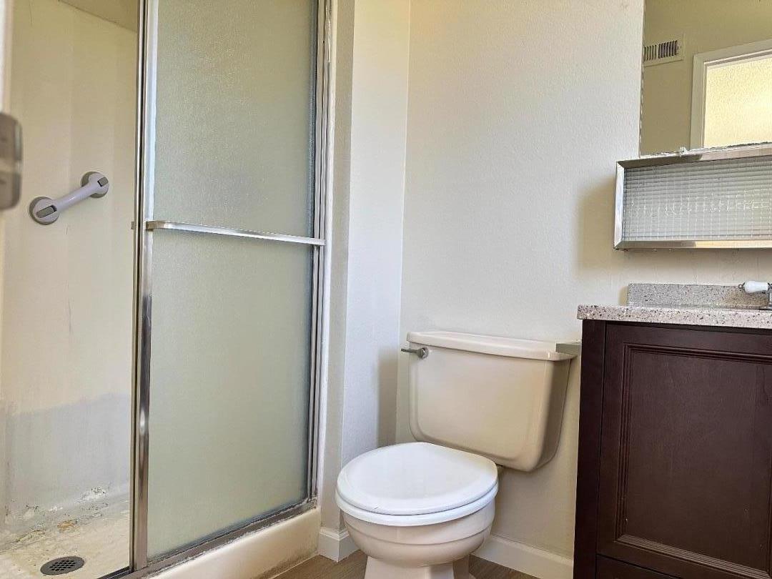 1710 Merrill Loop San Jose, CA 95124 - Photo 6 of 11 a bathroom with a granite countertop toilet and a sink