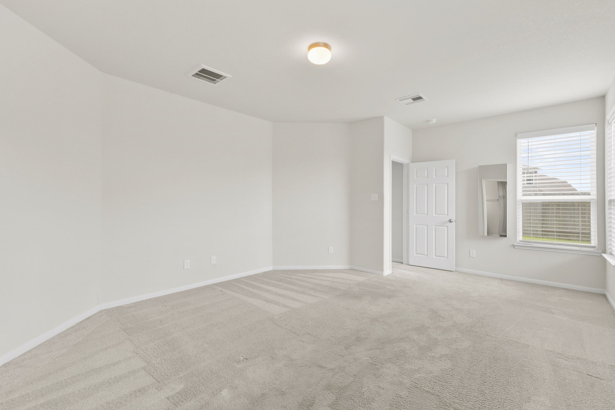 3011 Tandem Court Rosenberg, TX 77471 - Photo 13 of 29 a view of an empty room with a window