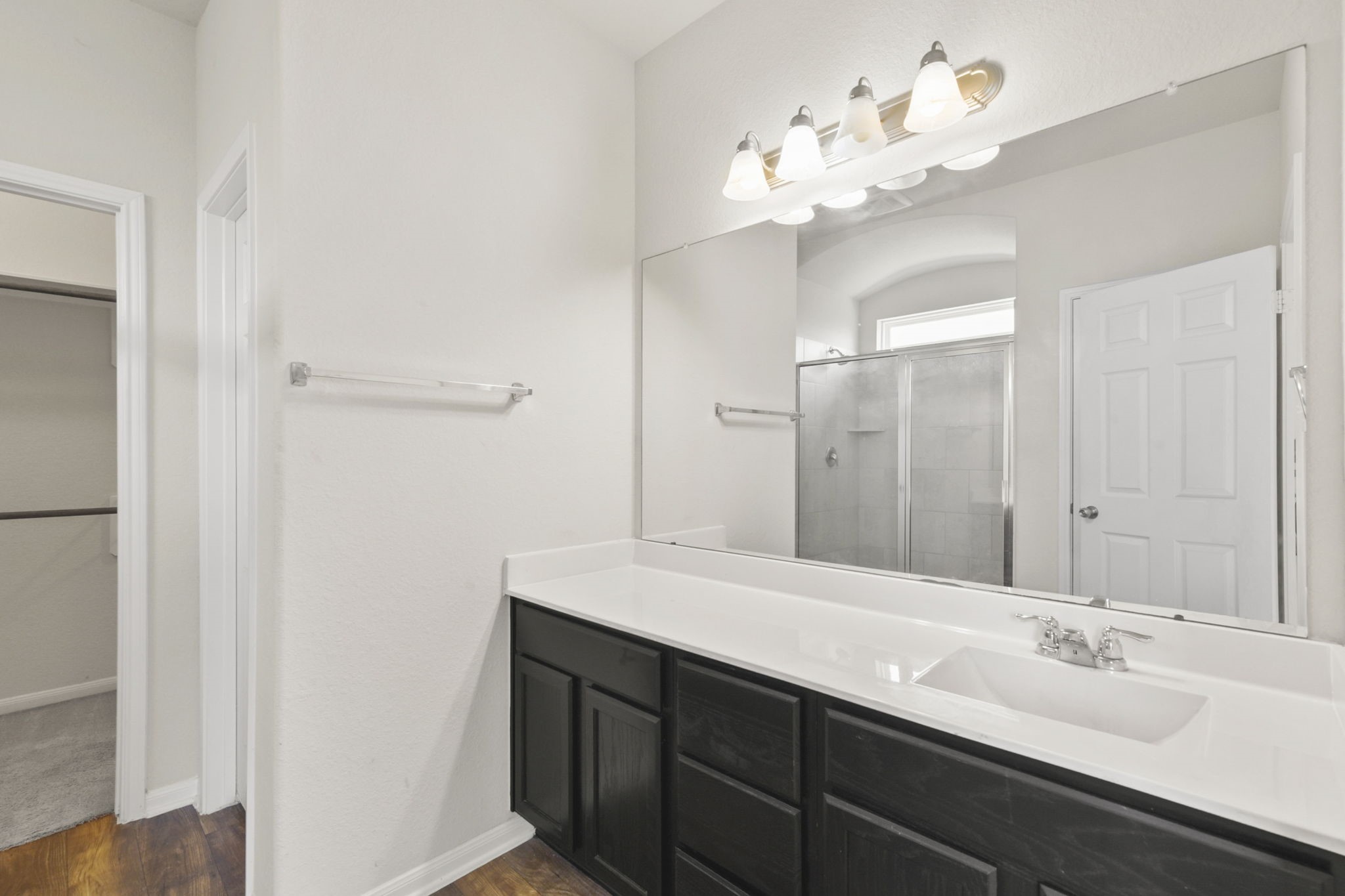 3011 Tandem Court Rosenberg, TX 77471 - Photo 14 of 29 a bathroom with a double vanity sink and a mirror