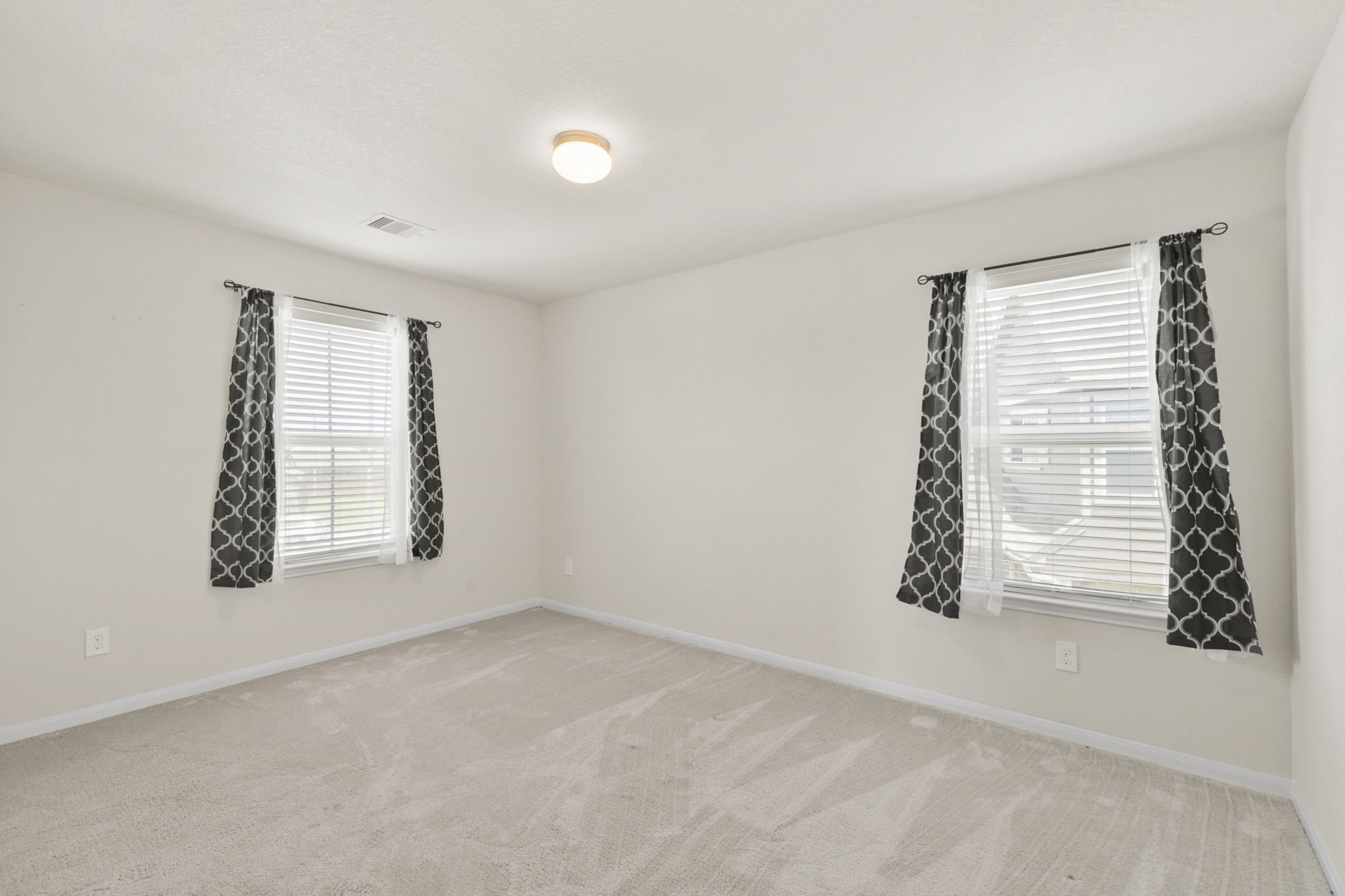 3011 Tandem Court Rosenberg, TX 77471 - Photo 21 of 29 an empty room with windows