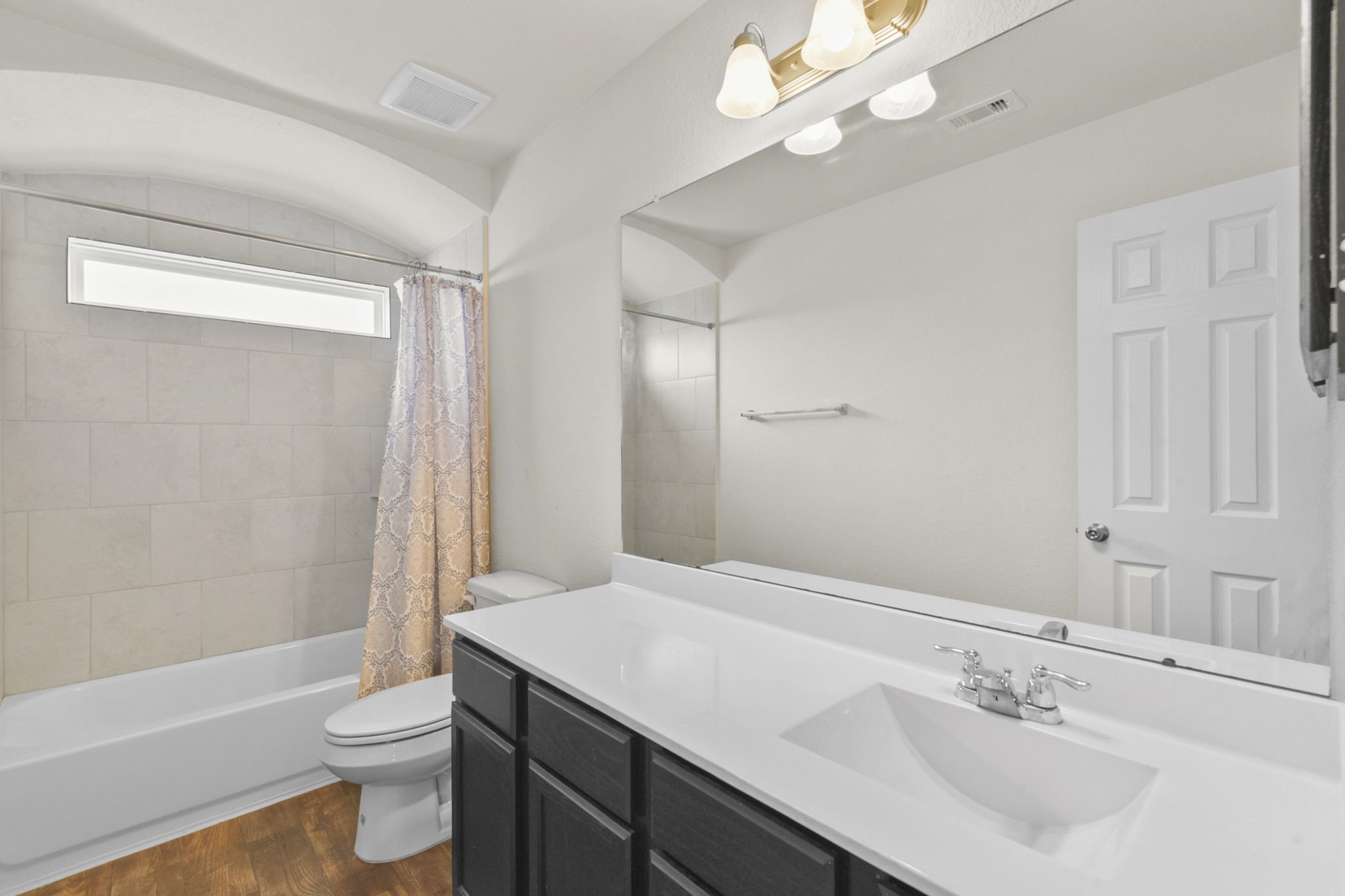 3011 Tandem Court Rosenberg, TX 77471 - Photo 24 of 29 a bathroom with a sink a toilet a mirror and shower