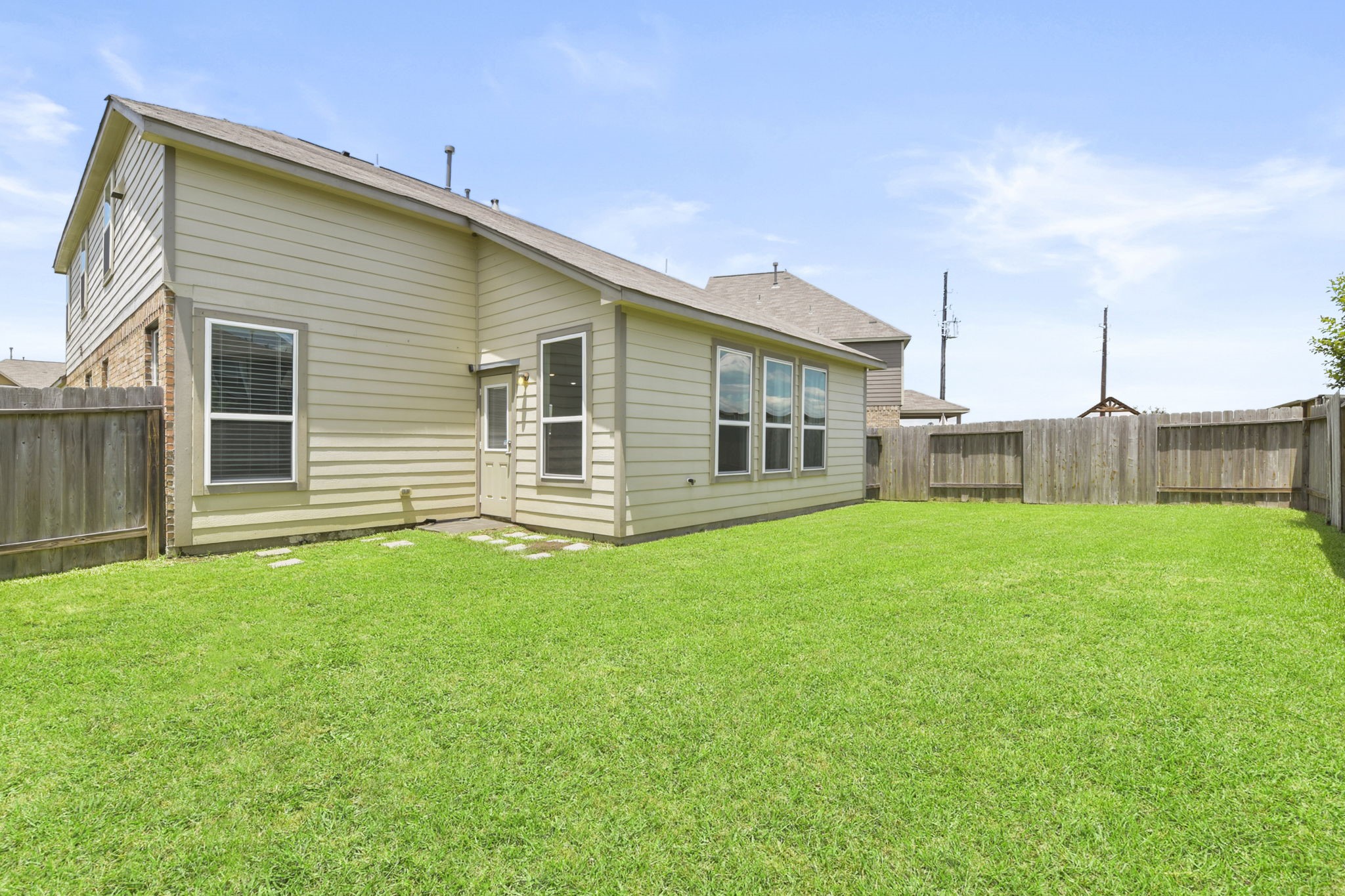 3011 Tandem Court Rosenberg, TX 77471 - Photo 27 of 29 a view of a house with backyard