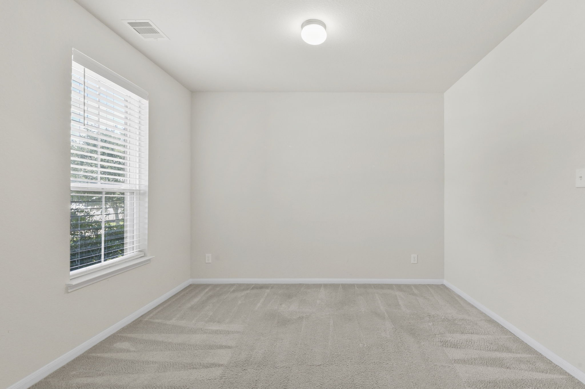 3011 Tandem Court Rosenberg, TX 77471 - Photo 3 of 29 an empty room with a window