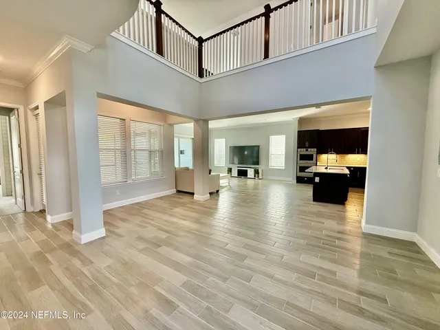 a view of an entryway and livingroom with furniture