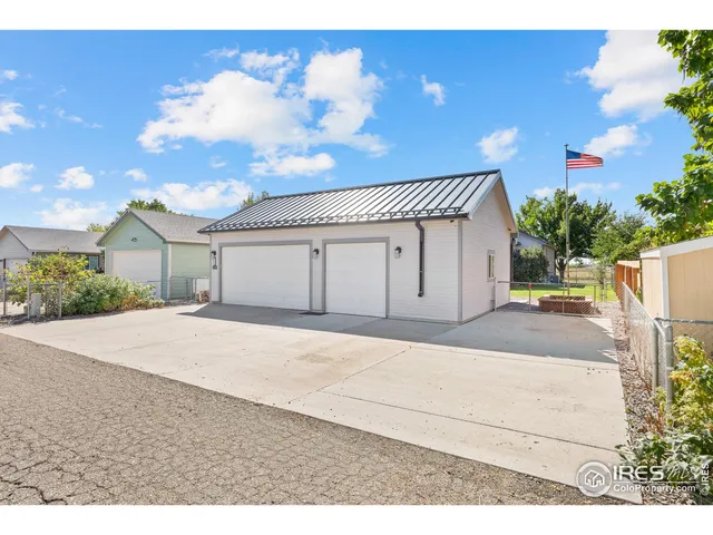 a view of a garage with gym equipment