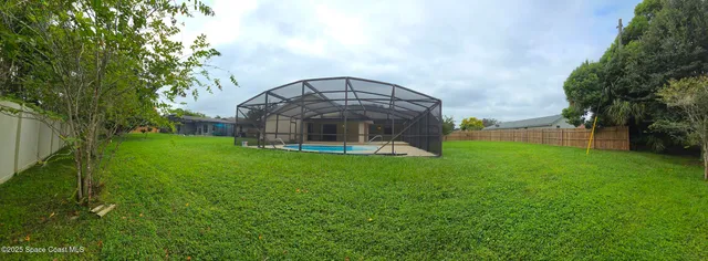 a view of empty room with windows
