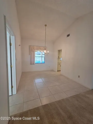 an empty room with an entryway