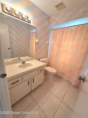 a view of a livingroom with a window