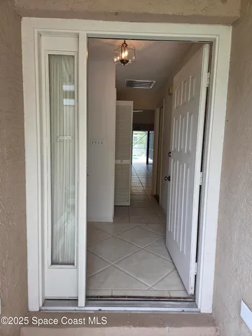 a picture of a bathroom with a shower