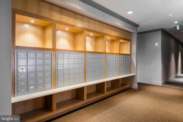 a view of a balcony with wooden floor outdoor seating and city view