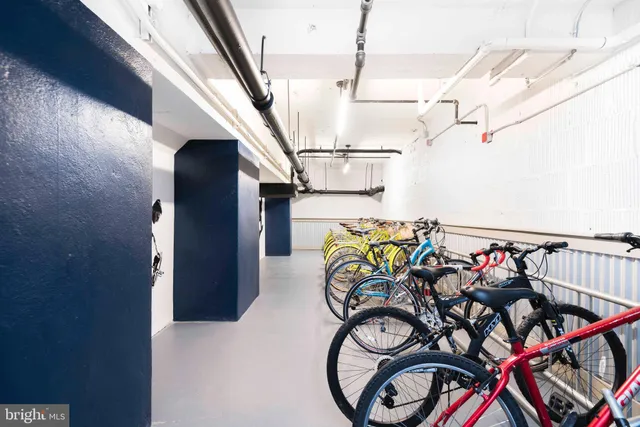 a kitchen with a refrigerator and a sink