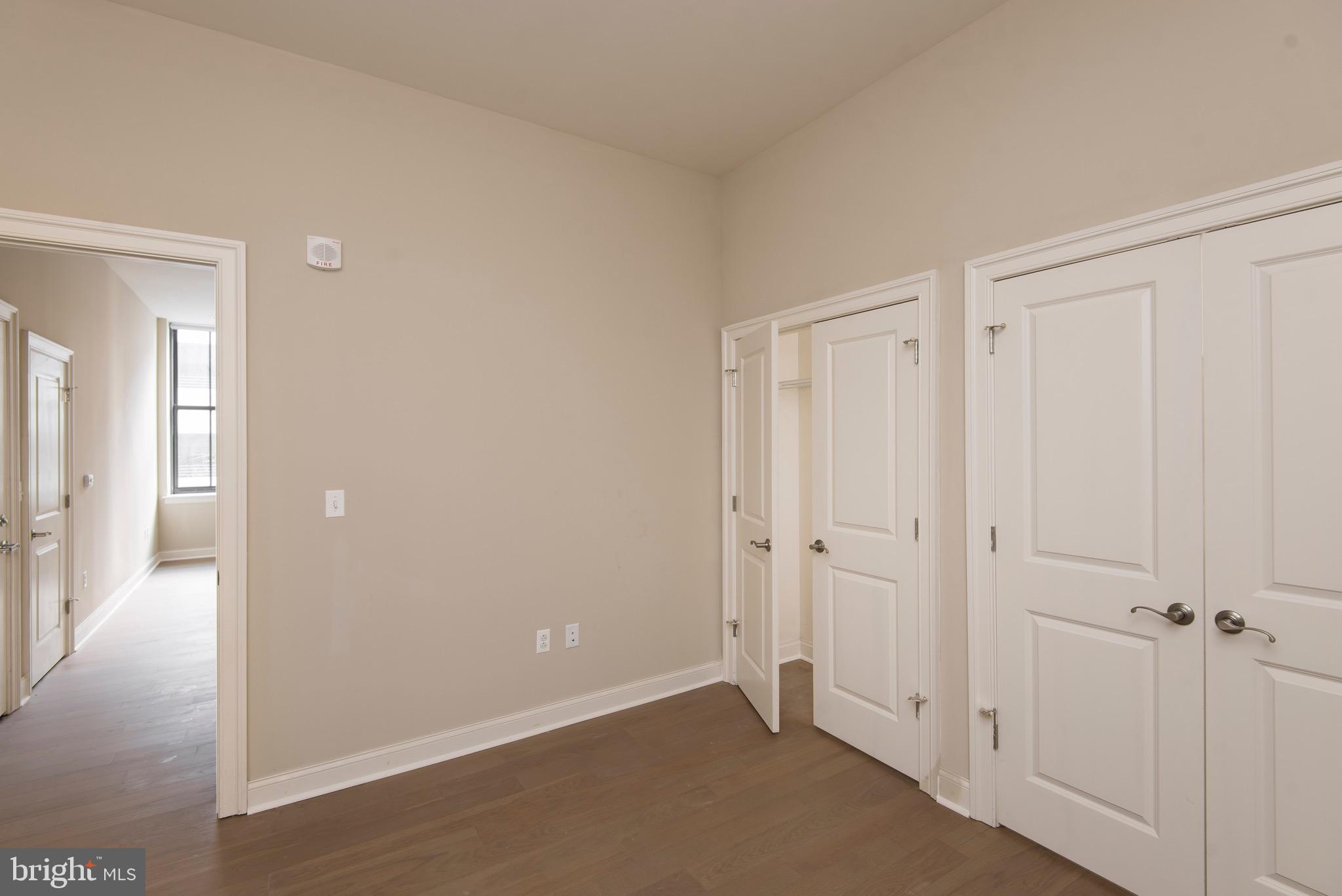103 South Gay Street, Unit 1BR Baltimore, MD 21202 - Photo 38 of 92 a view of a hallway with wooden floor