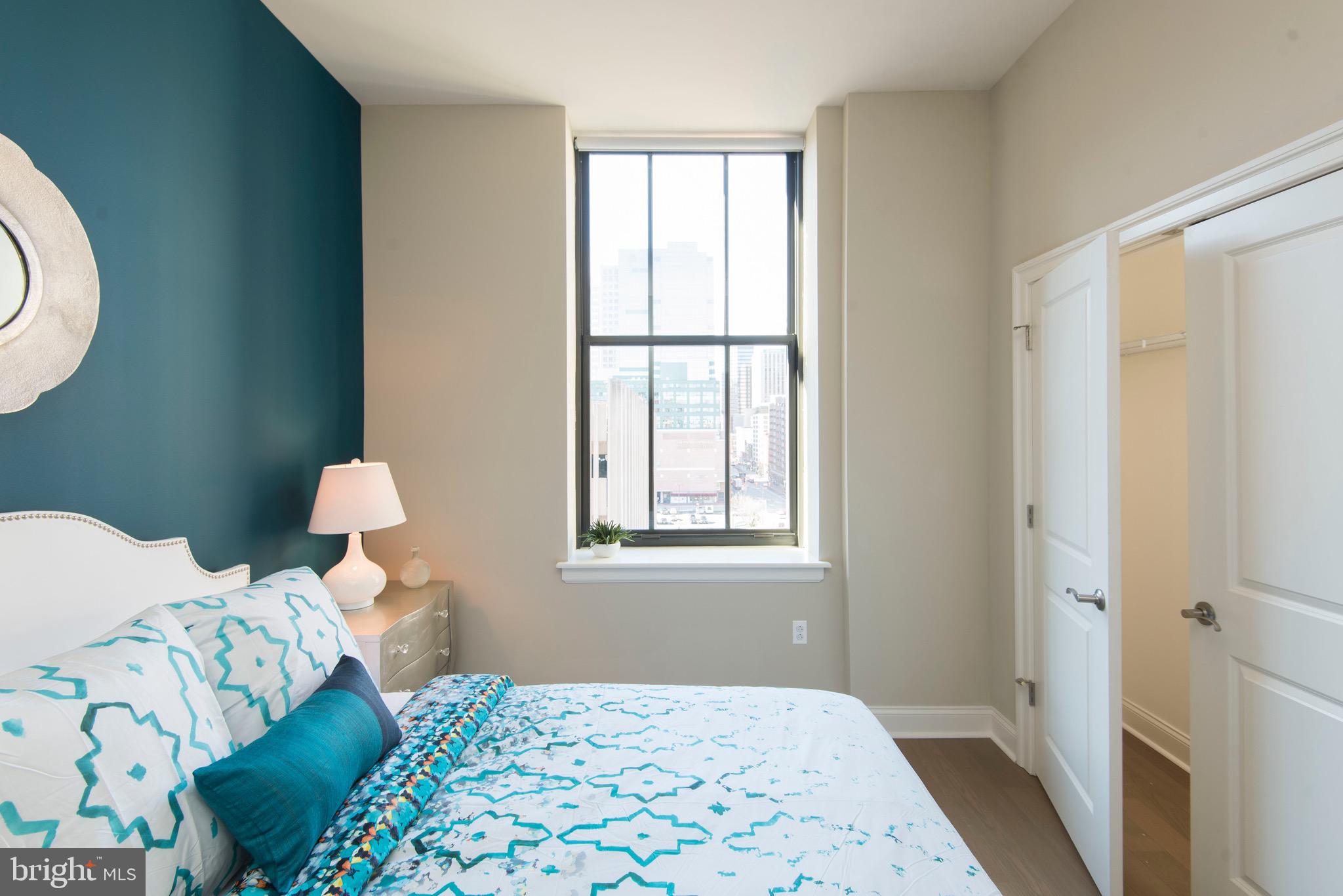 103 South Gay Street, Unit 1BR Baltimore, MD 21202 - Photo 47 of 92 a bedroom with a bed and a window