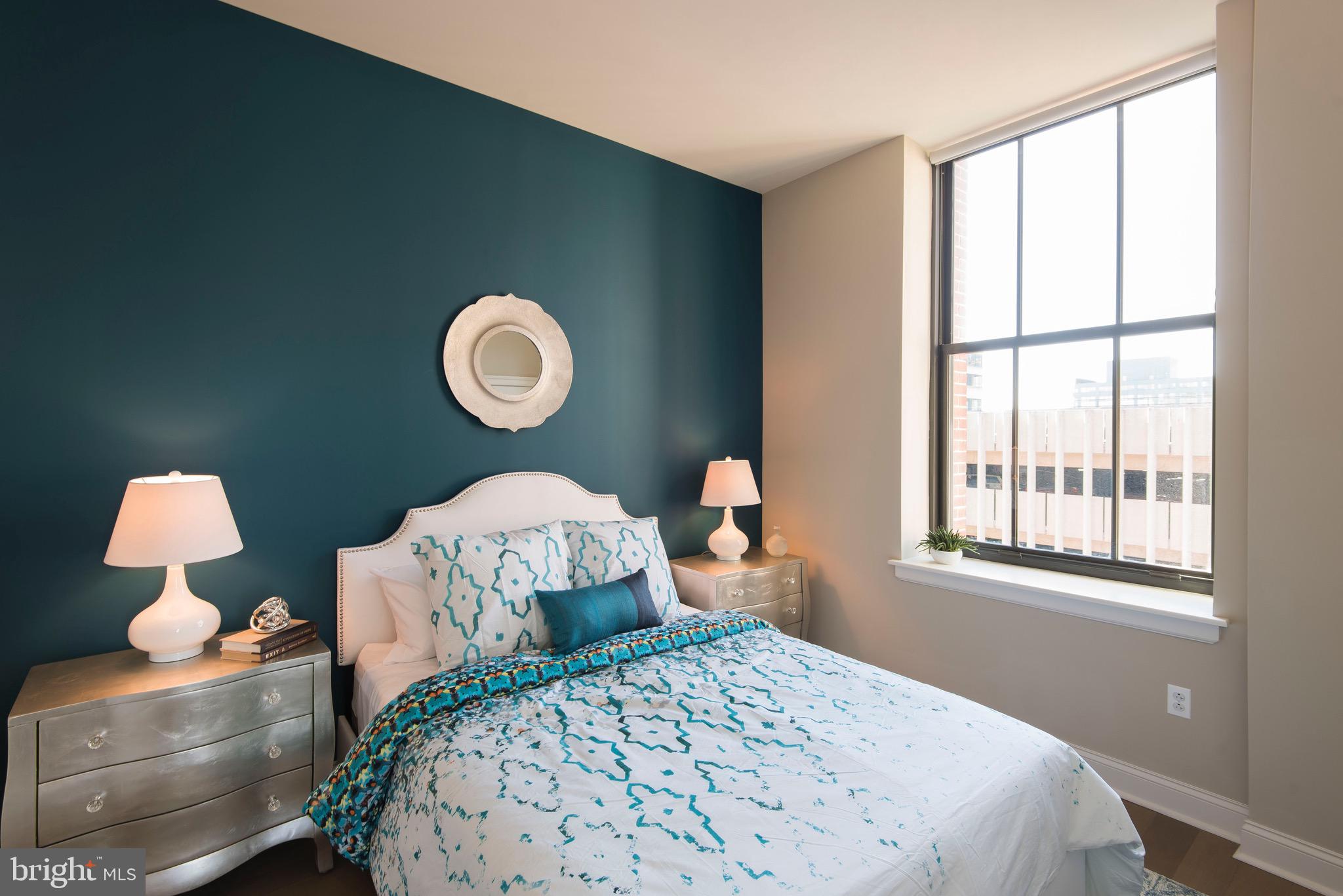 103 South Gay Street, Unit 1BR Baltimore, MD 21202 - Photo 49 of 92 a bedroom with a bed and a window