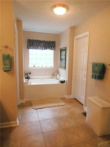 1015 Anderson Road Dickson, TN 37055 - Photo 12 of 20 a view of bathroom with bathtub and shower