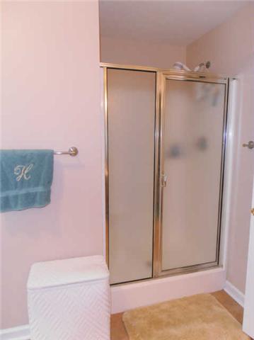 1015 Anderson Road Dickson, TN 37055 - Photo 13 of 20 a bathroom with a shower and a toilet
