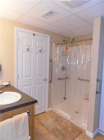 1015 Anderson Road Dickson, TN 37055 - Photo 17 of 20 a bathroom with a sink and shower