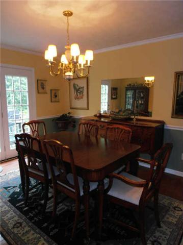 1015 Anderson Road Dickson, TN 37055 - Photo 6 of 20 a dining room with furniture and chandelier