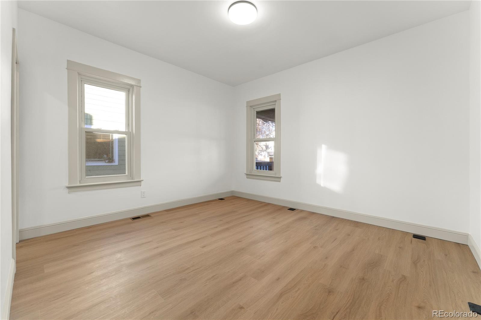 2963 South Lincoln Street Englewood, CO 80113 - Photo 18 of 50 an empty room with windows